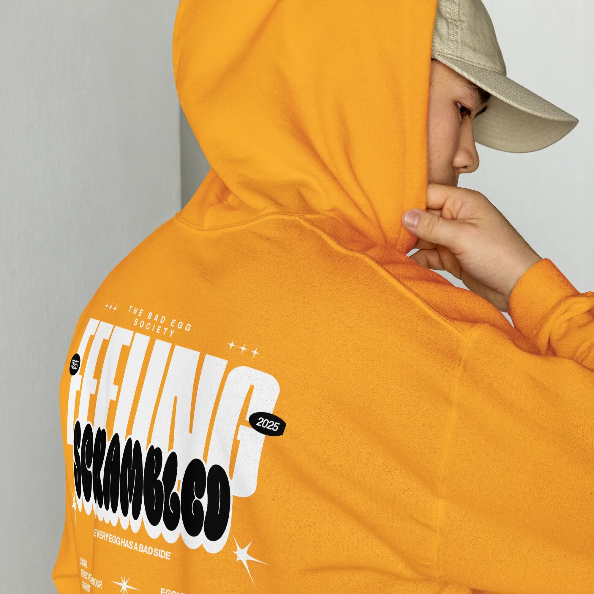 “Feeling Scrambled TBES hoodie – orange unisex streetwear with emotional design”